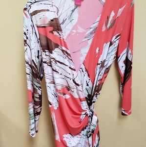 Salmon colored tropical wrap dress